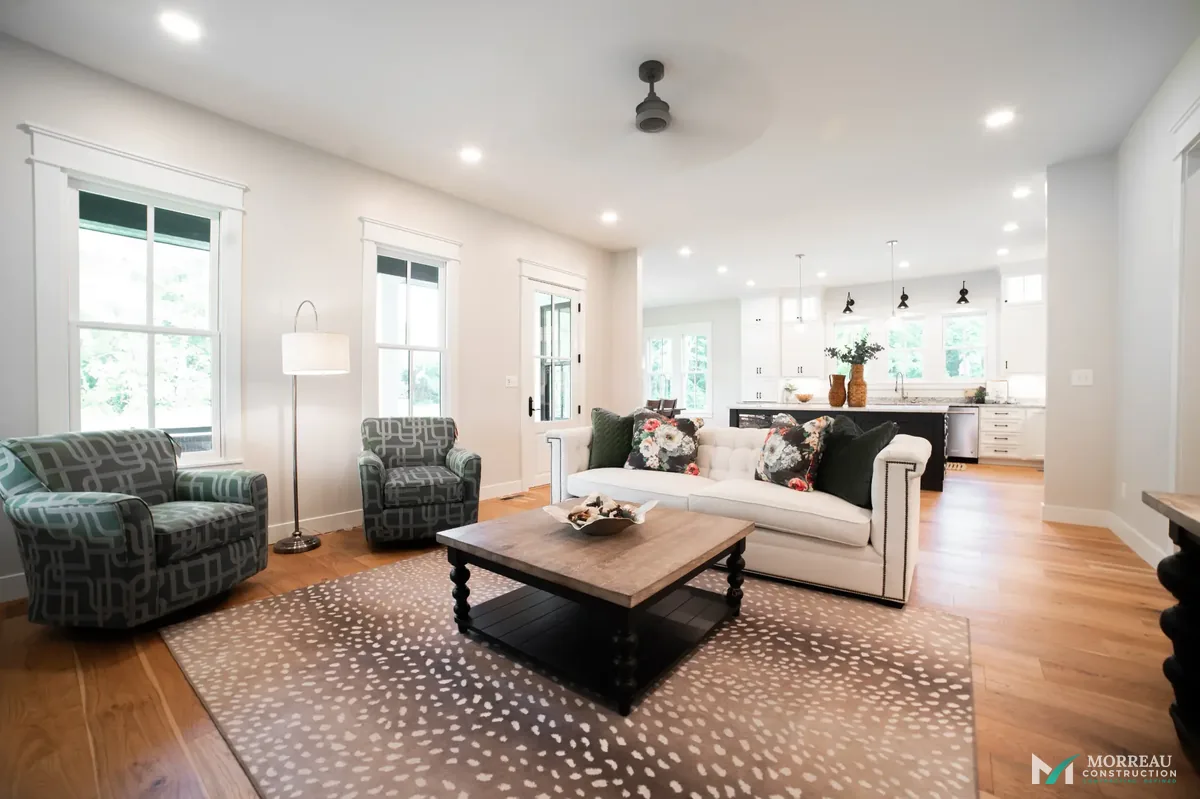 Open living and kitchen in farmhouse style custom home