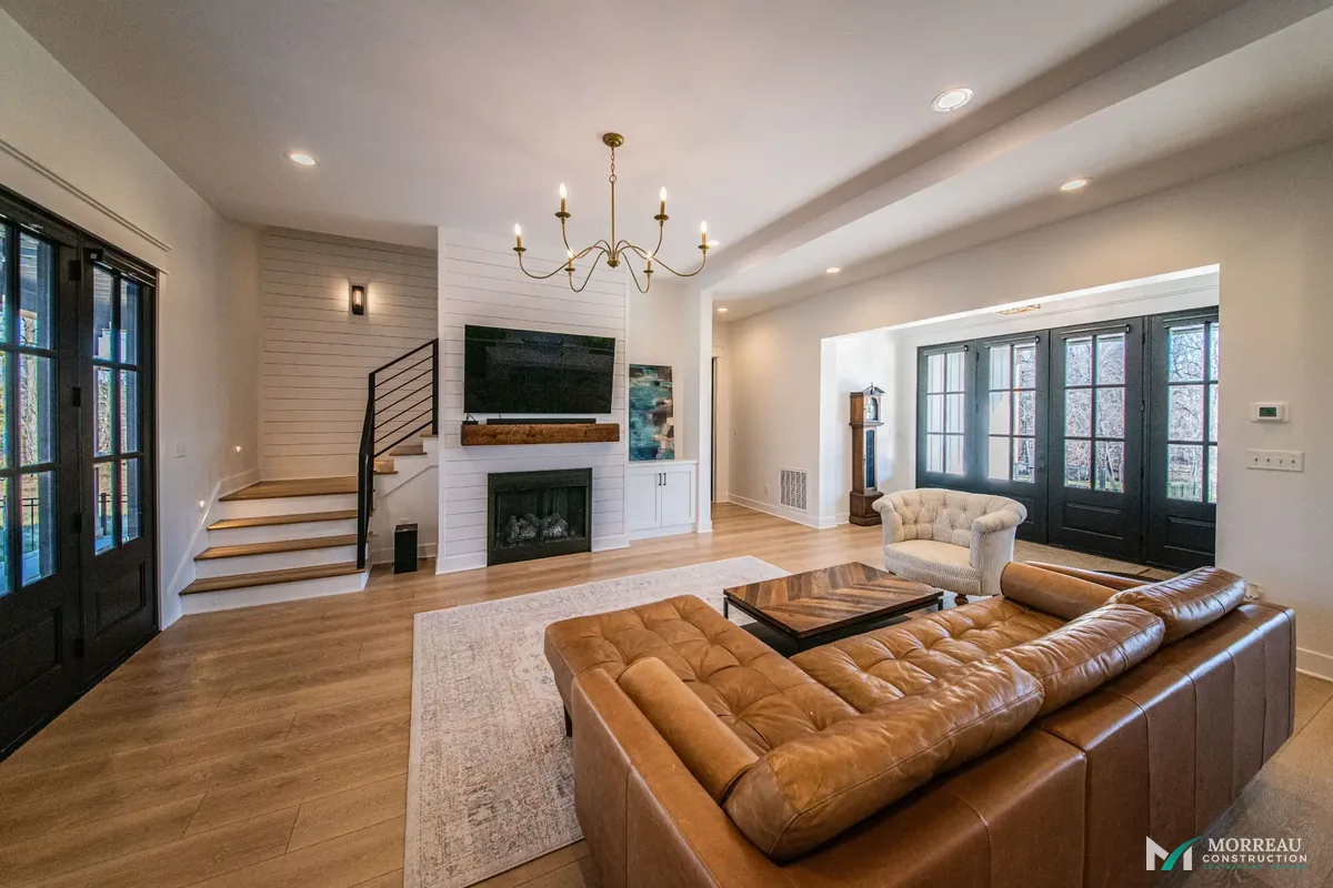 Great room with coffered ceiling and fireplace